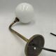 Brass and glass wall light