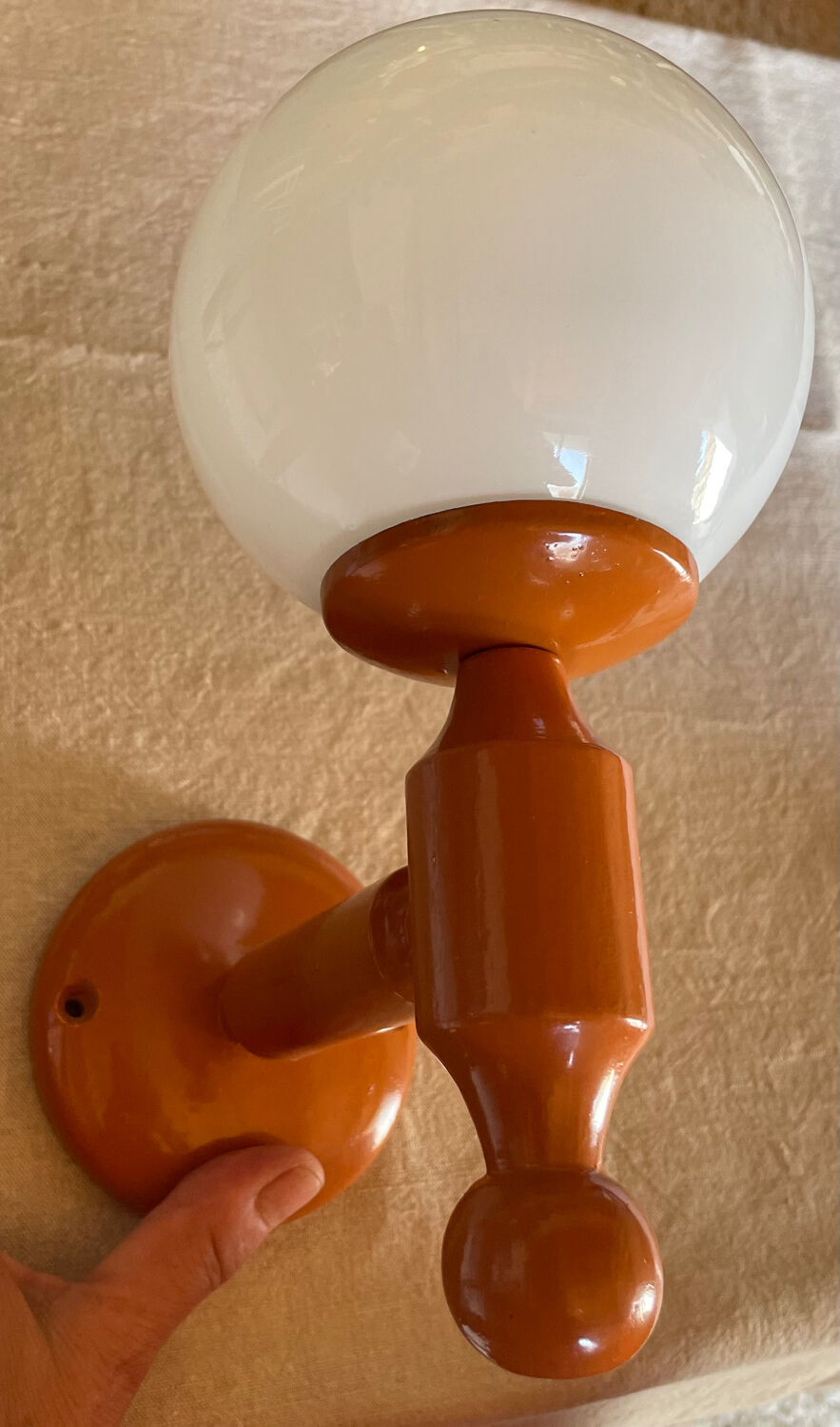 Vintage wooden globe wall light in white glass