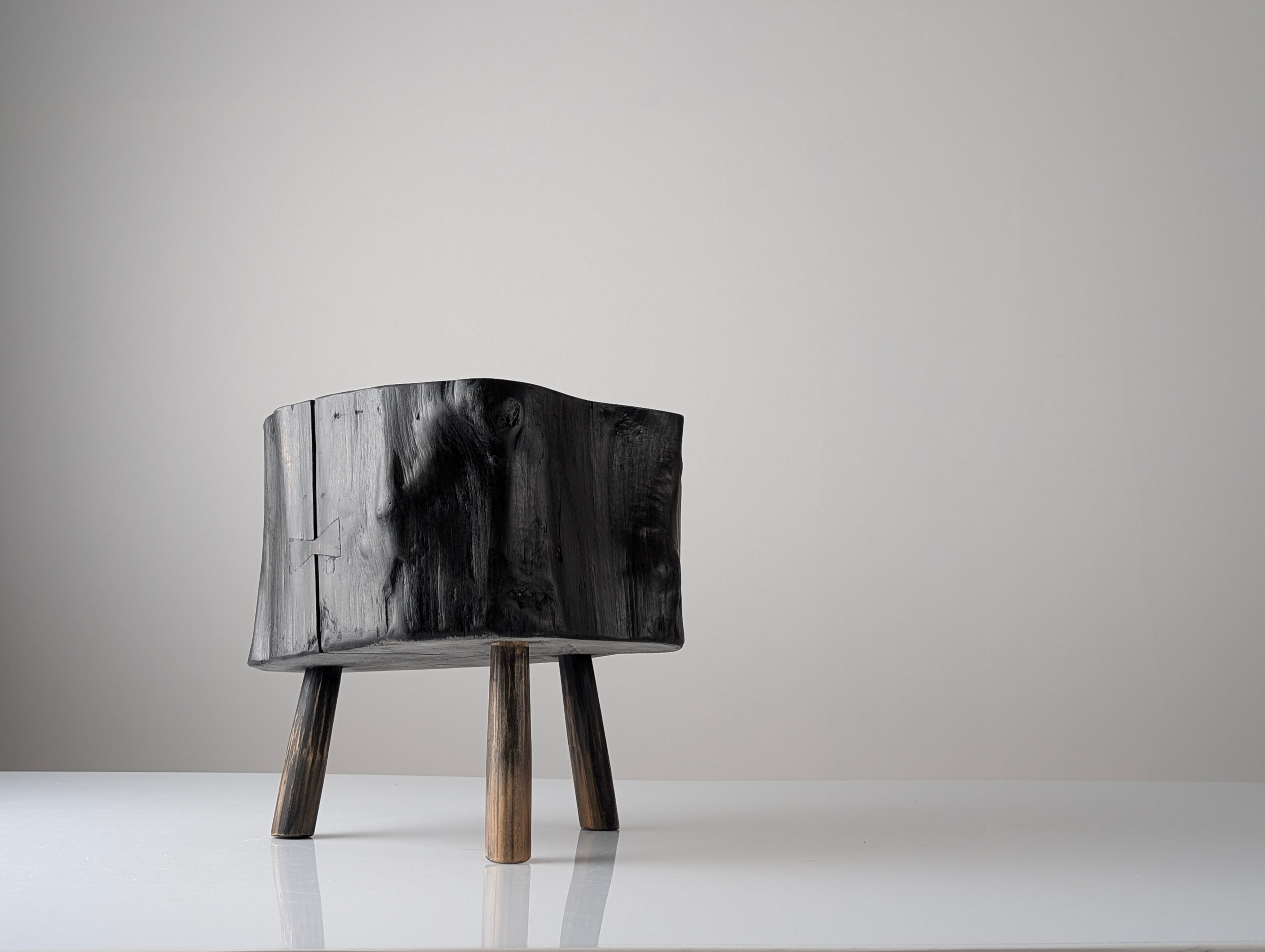 Wabi-Sabi black ebonised wood stool with butterfly joints