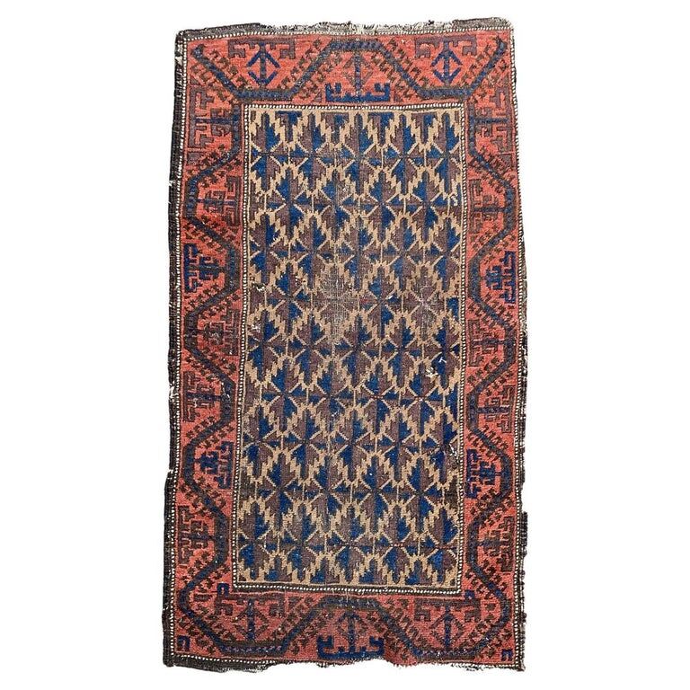 Antique Baloch carpet 126x71cm