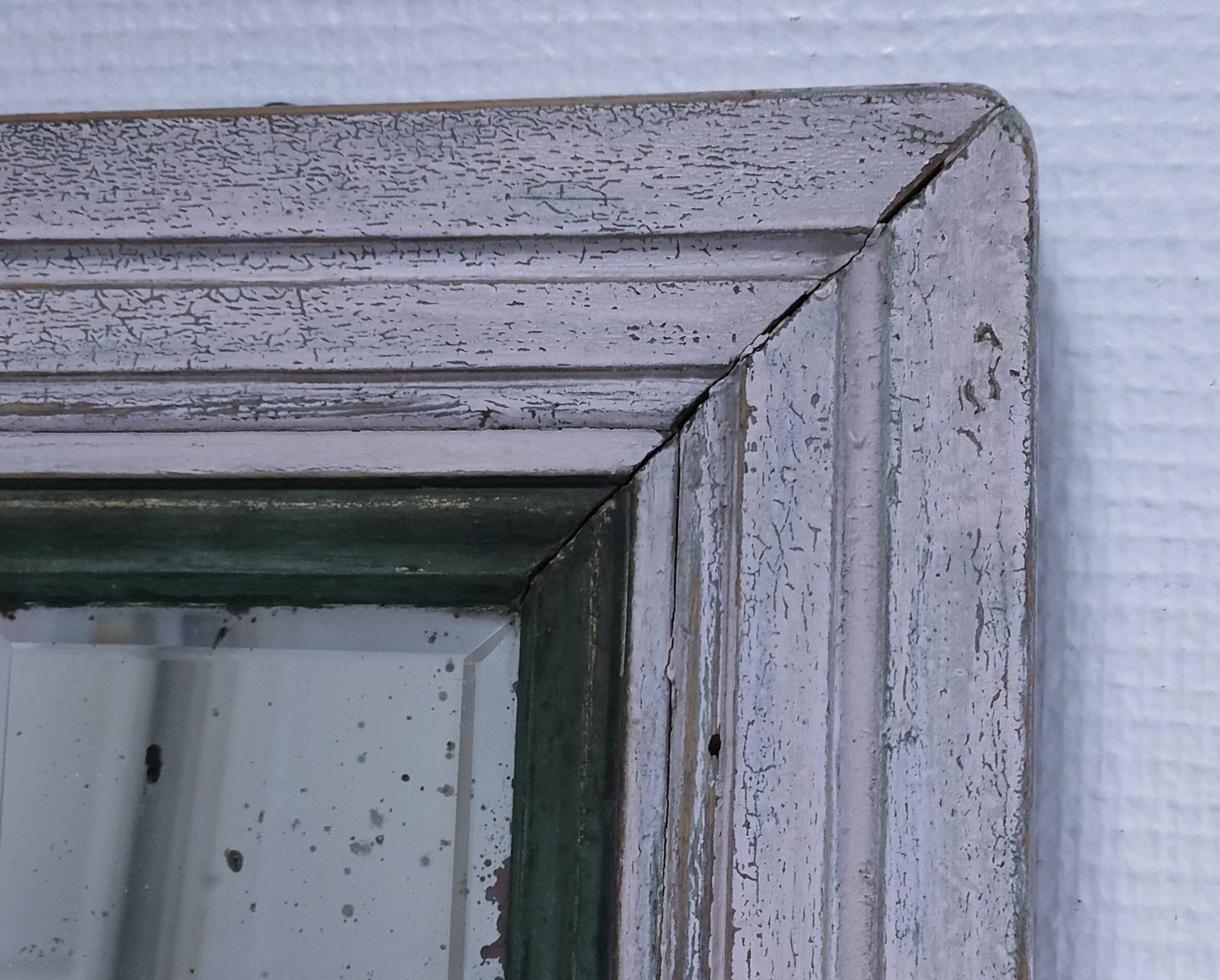 Miroir biseauté bois patiné début xxème