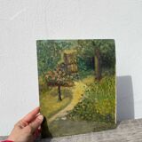Garden landscape in oil signed