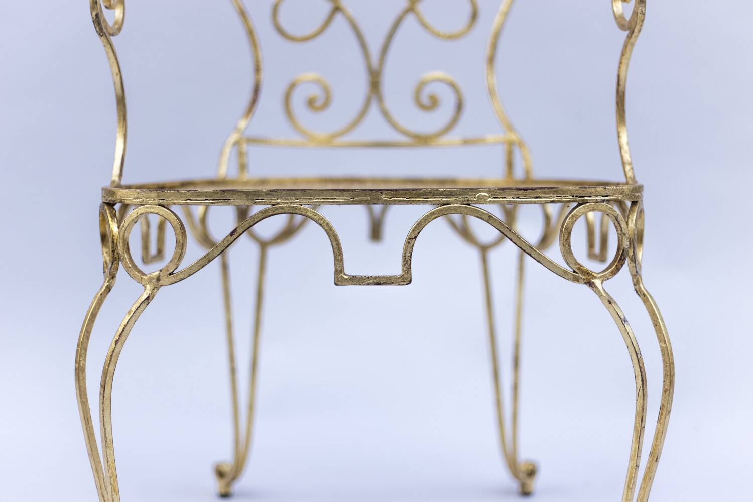 Pair of wrought iron and gilded armchairs, circa 1990