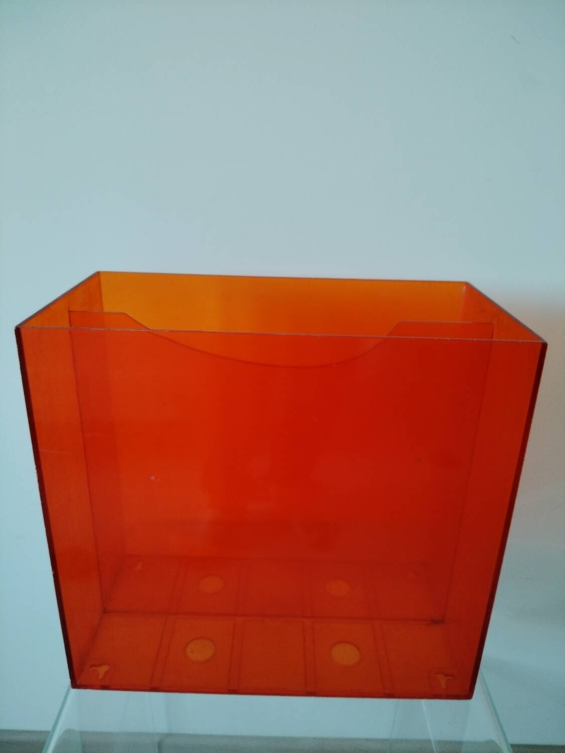 Vinyl magazine holder in orange plexiglass