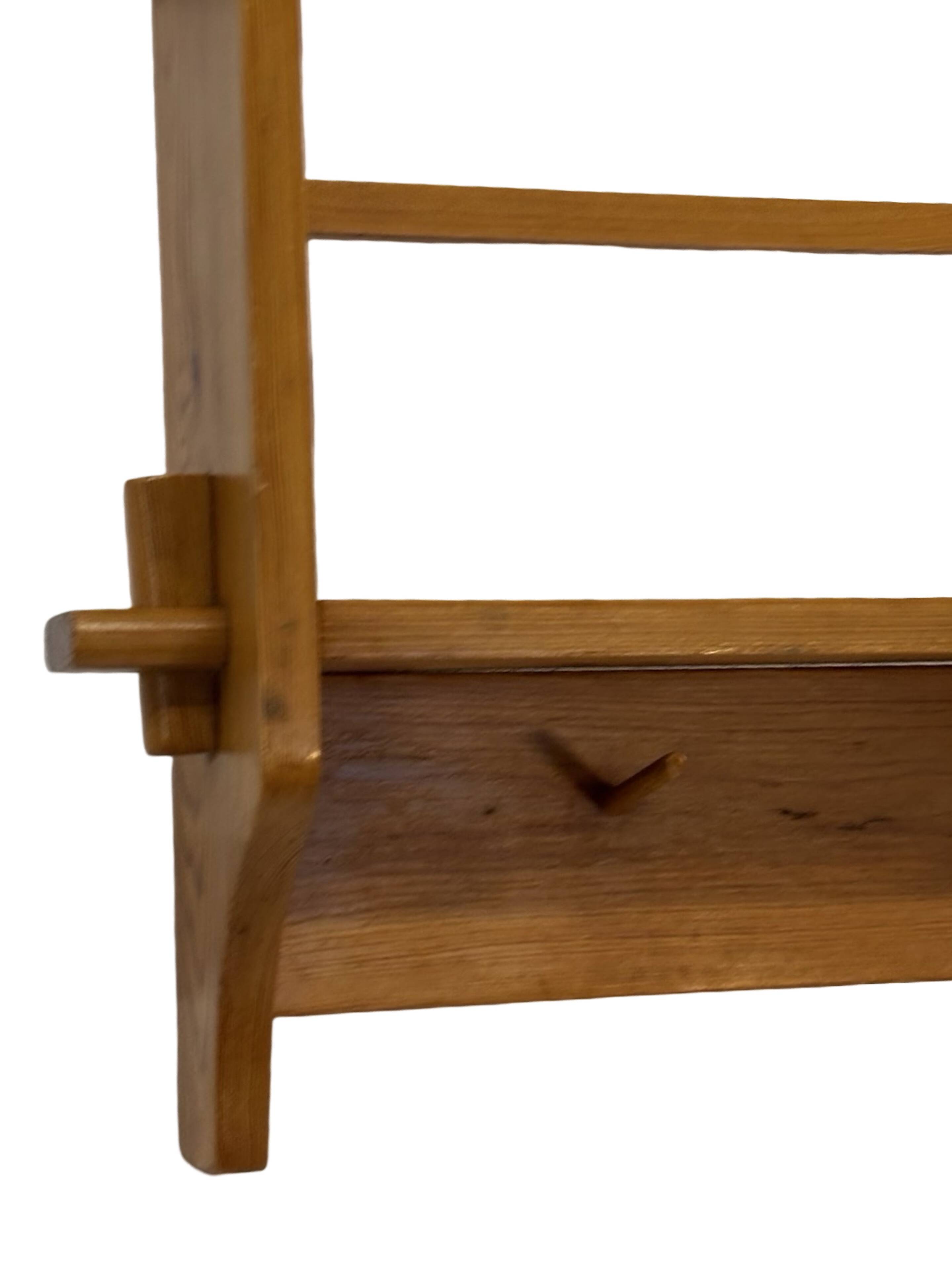 Vintage wooden wall shelve rack bookshelf in pinewood minimalist design