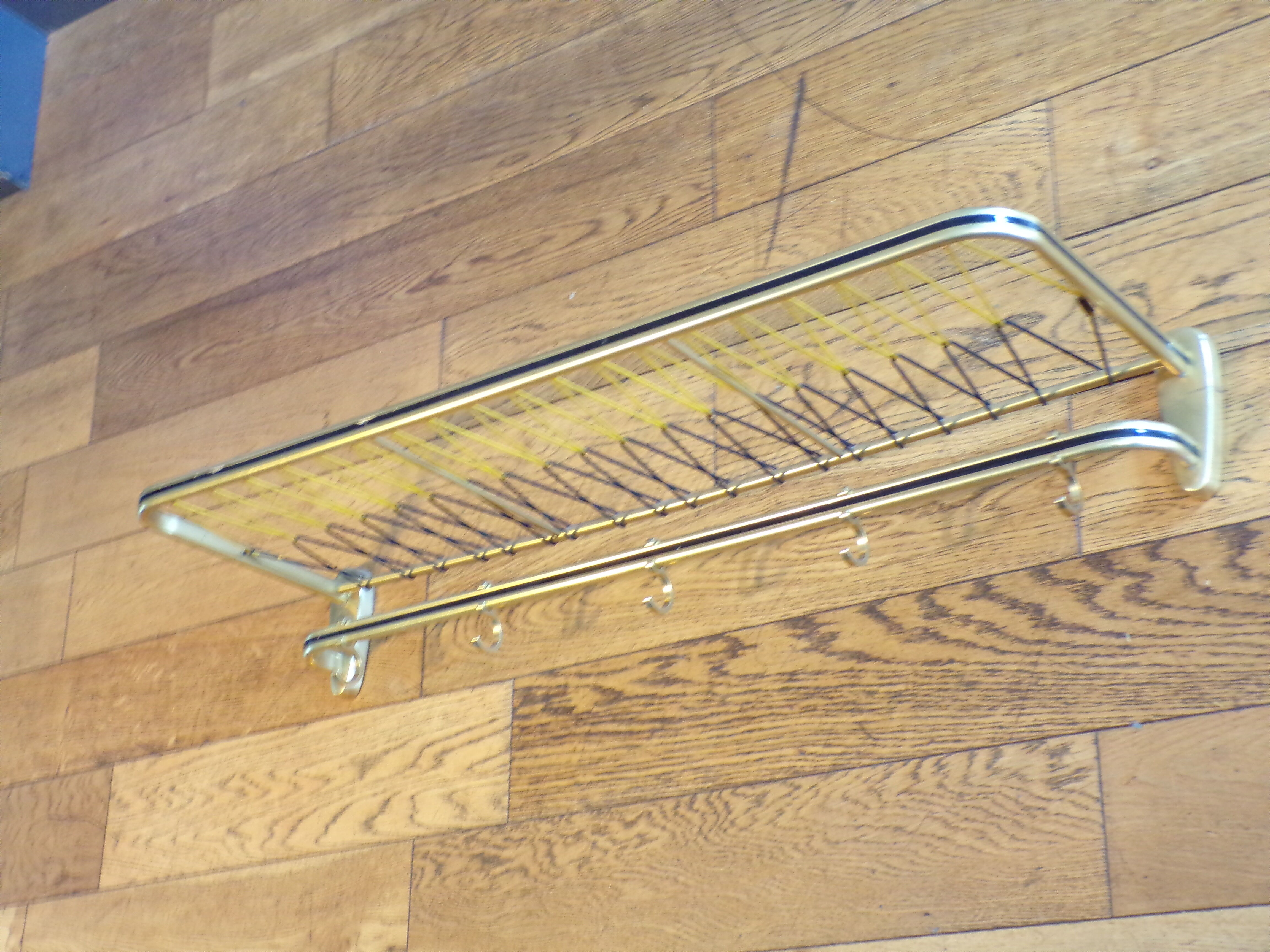 Vintage coat racks like train luggage racks
