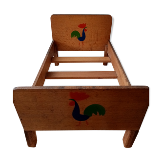 Wooden doll bed