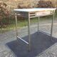 Vintage table with square chrome tubular metal base and marble top.