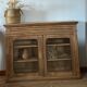 Old glass-fronted Parisian buffet in raw solid wood