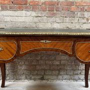 Antique French-style desk with green leather top and bronze mounts