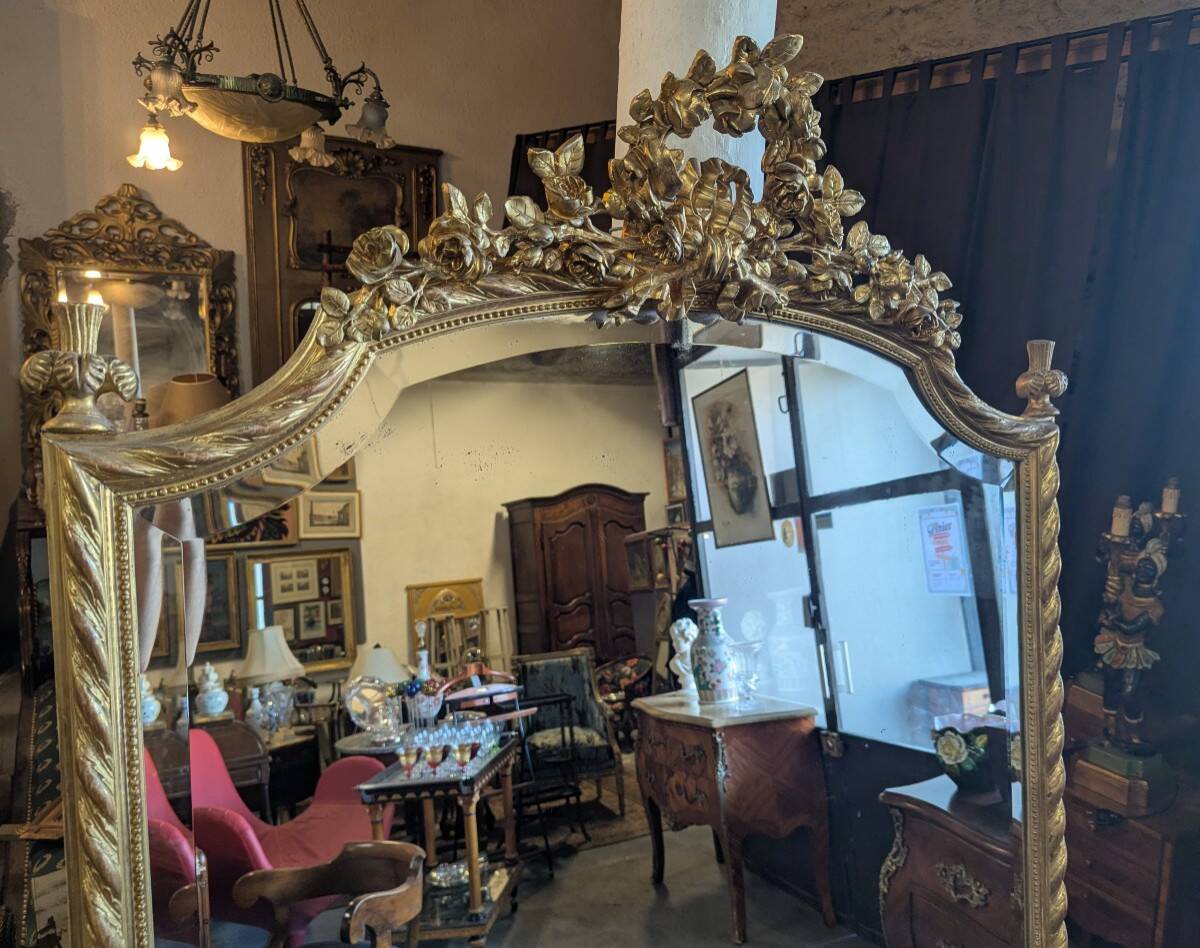 Very large Louis XVI style mirror in wood and gilded stucco with gold leaf