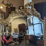 Very large Louis XVI style mirror in wood and gilded stucco with gold leaf