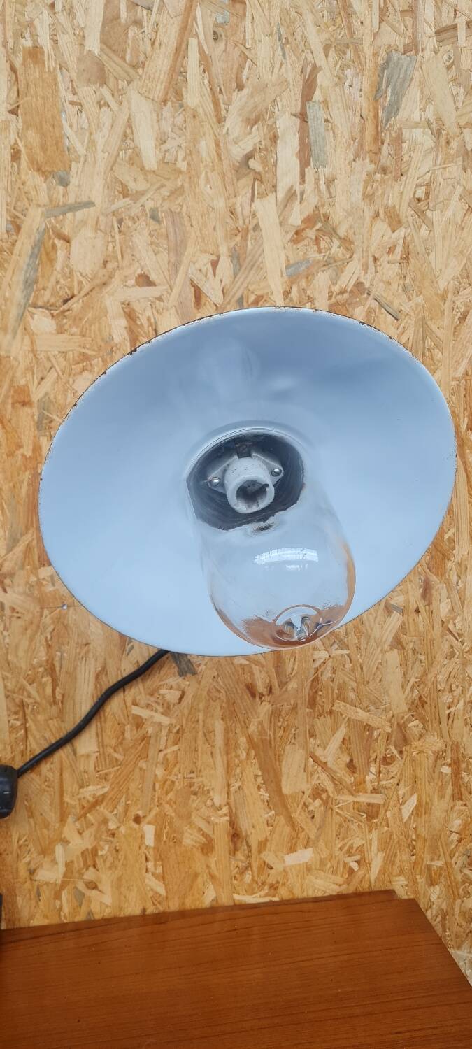 Exterior wall light in enamelled sheet metal