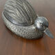 Serving dish with bell in silver metal shape duck
