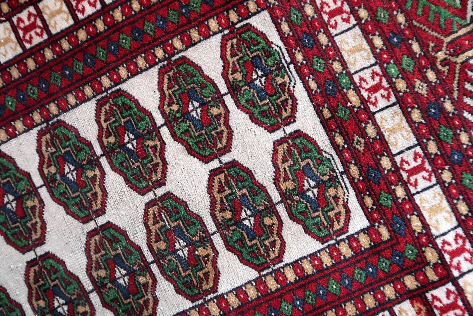 Handmade vintage Uzbek Bukhara rug 77cm x 128cm 1960s - 1С1175