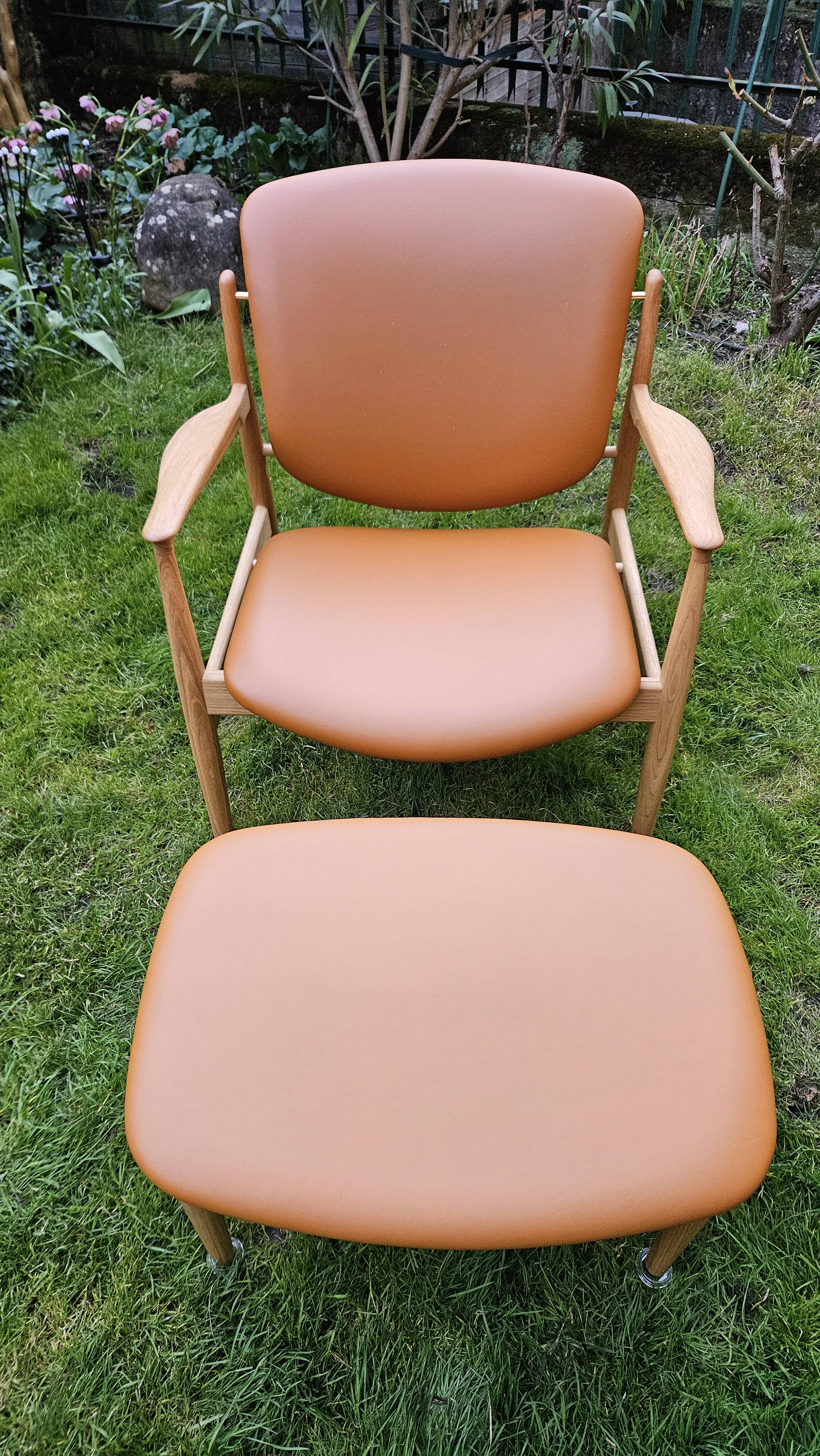 2 "The French Chair" seats by designer Finn Juhl and 1 matching footrest.