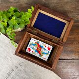 Carved wooden box with brass inlay