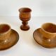 Trio of vintage ceramic and wood egg cups
