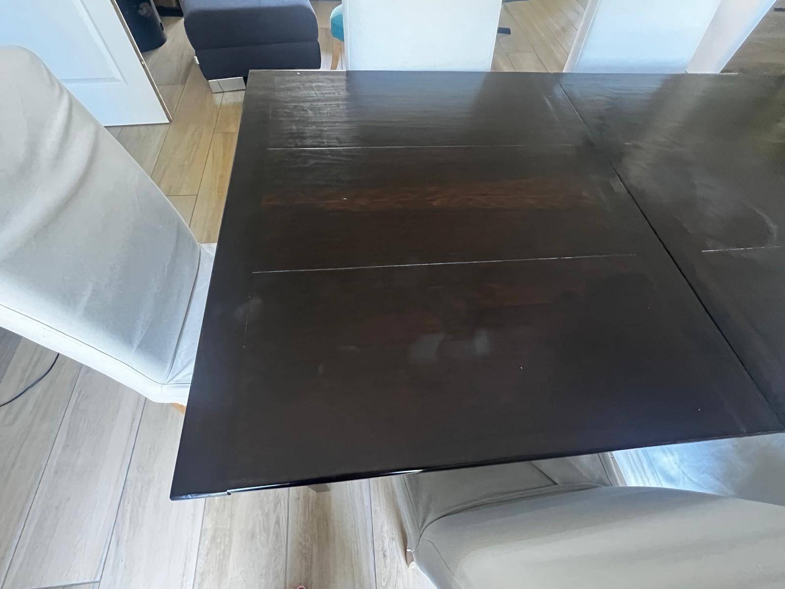 Solid cherry wood dining table, extendable for 8 to 12 people.