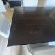 Solid cherry wood dining table, extendable for 8 to 12 people.