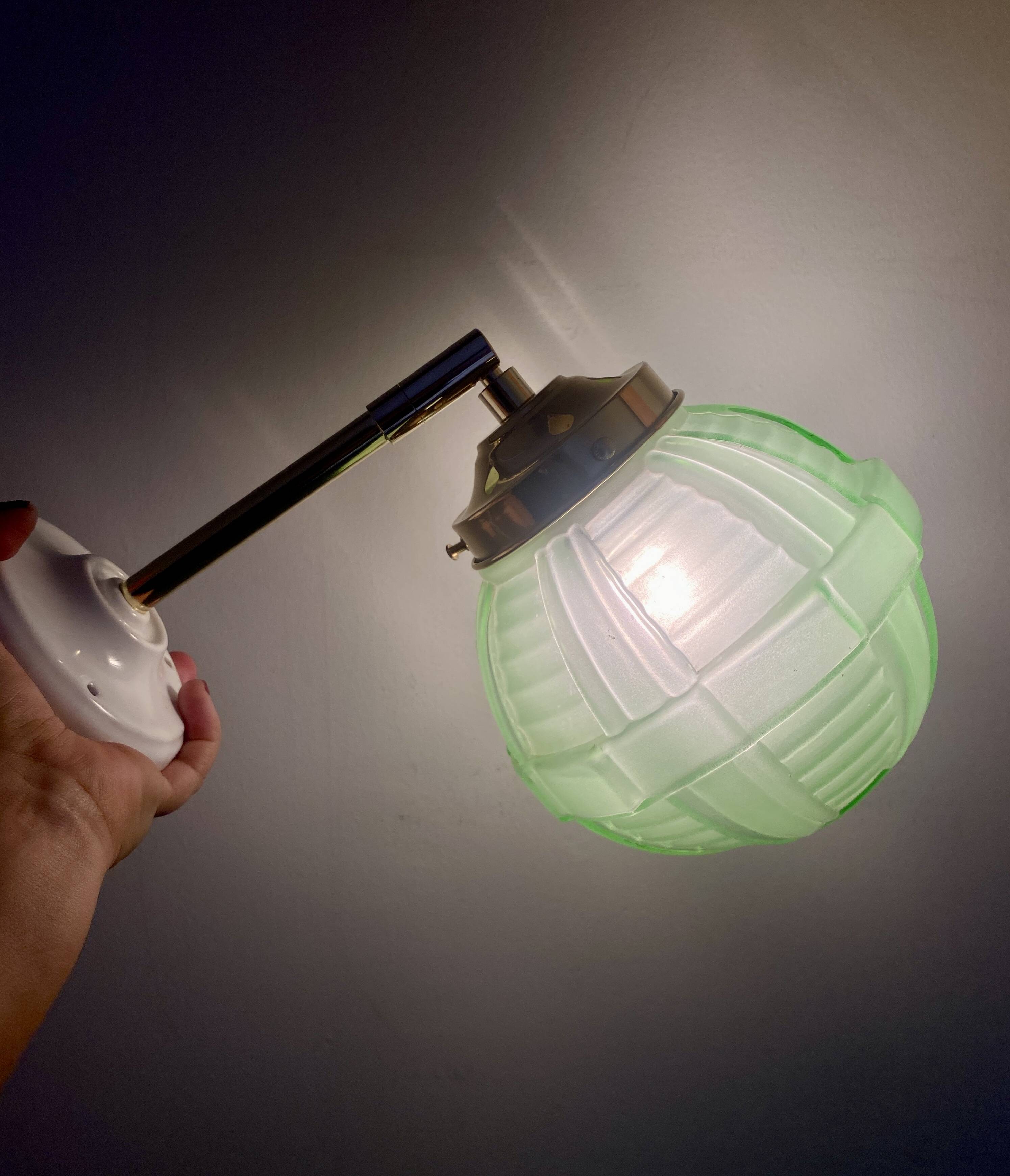 Vintage art deco globe wall light in green glass