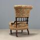 Victorian armchair with fabric pouf, England, 19th century.