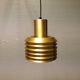 Hanging lamp in gold-colored aluminum with many layers of shades.