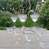 11 bottle-bottom bistro glasses with silver edging, early 20th century