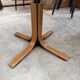 Modular round teak table with central base by Osvaldo Borsani.
