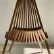 Foldable designer armchair in wooden slats