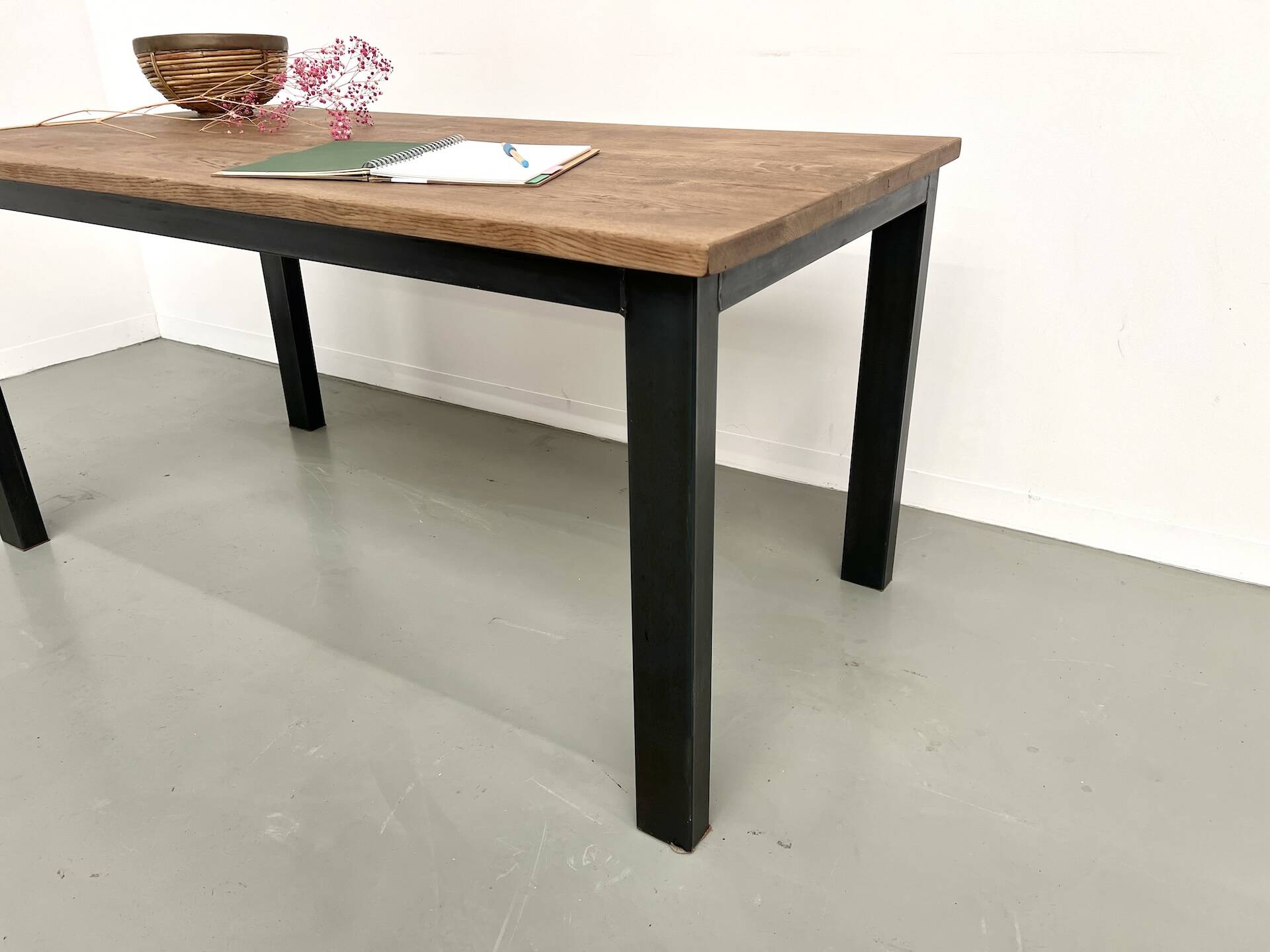 Solid oak dining table from the 70s with metal legs