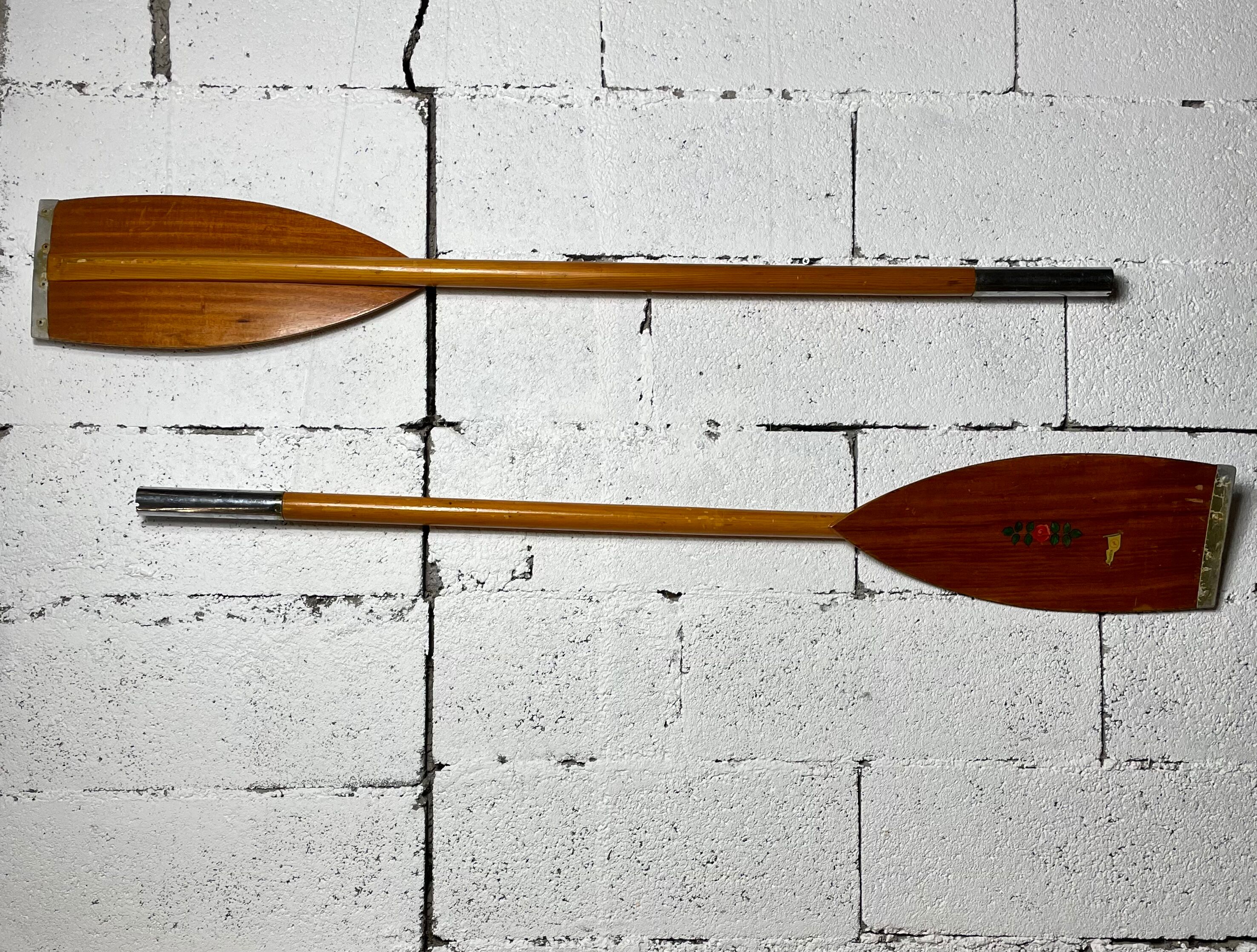 Pair of old wooden paddles