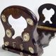 Folding bookends in wood and mother-of-pearl