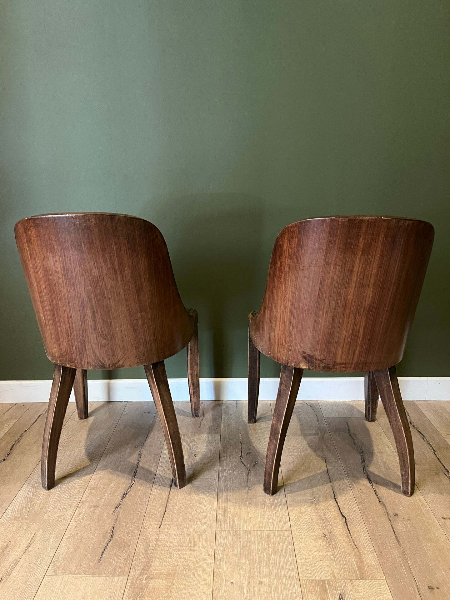 Pair of green leather gondola chairs Art Deco by De Coen