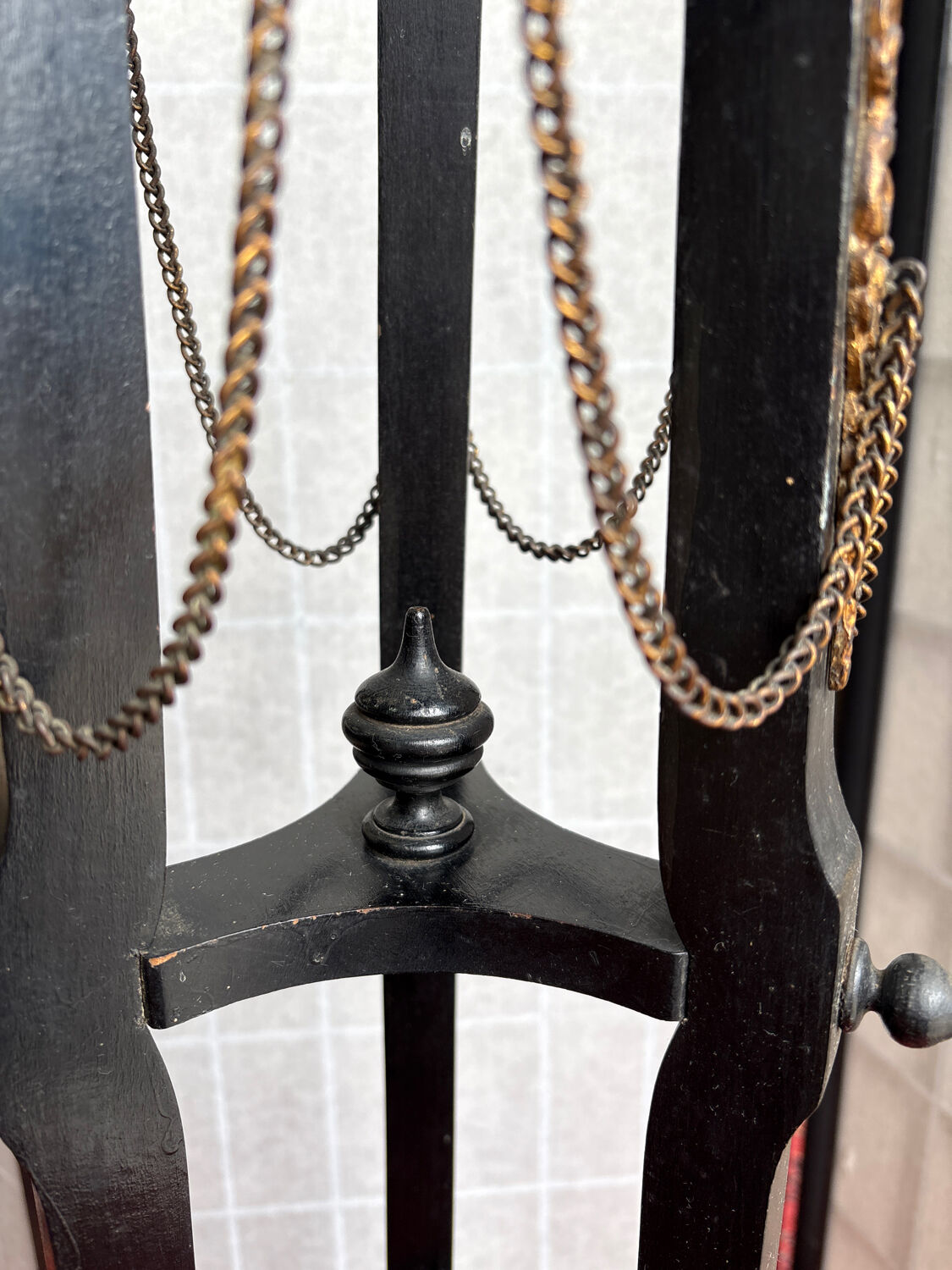 Napoleon III side table in blackened wood and bronze, decorated with chains, 19th century.