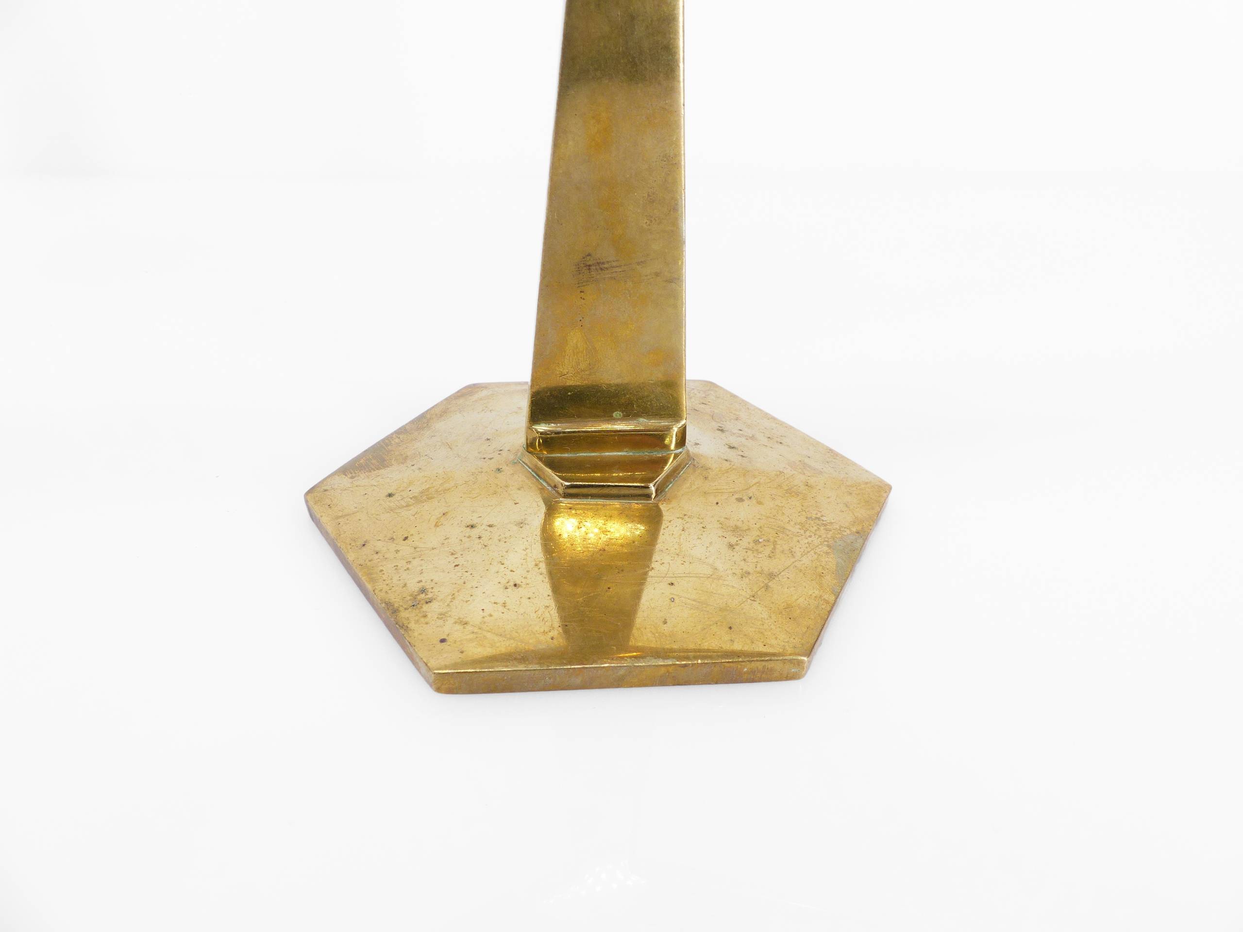 Pair of modernist three-armed solid brass candlesticks, circa 1960
