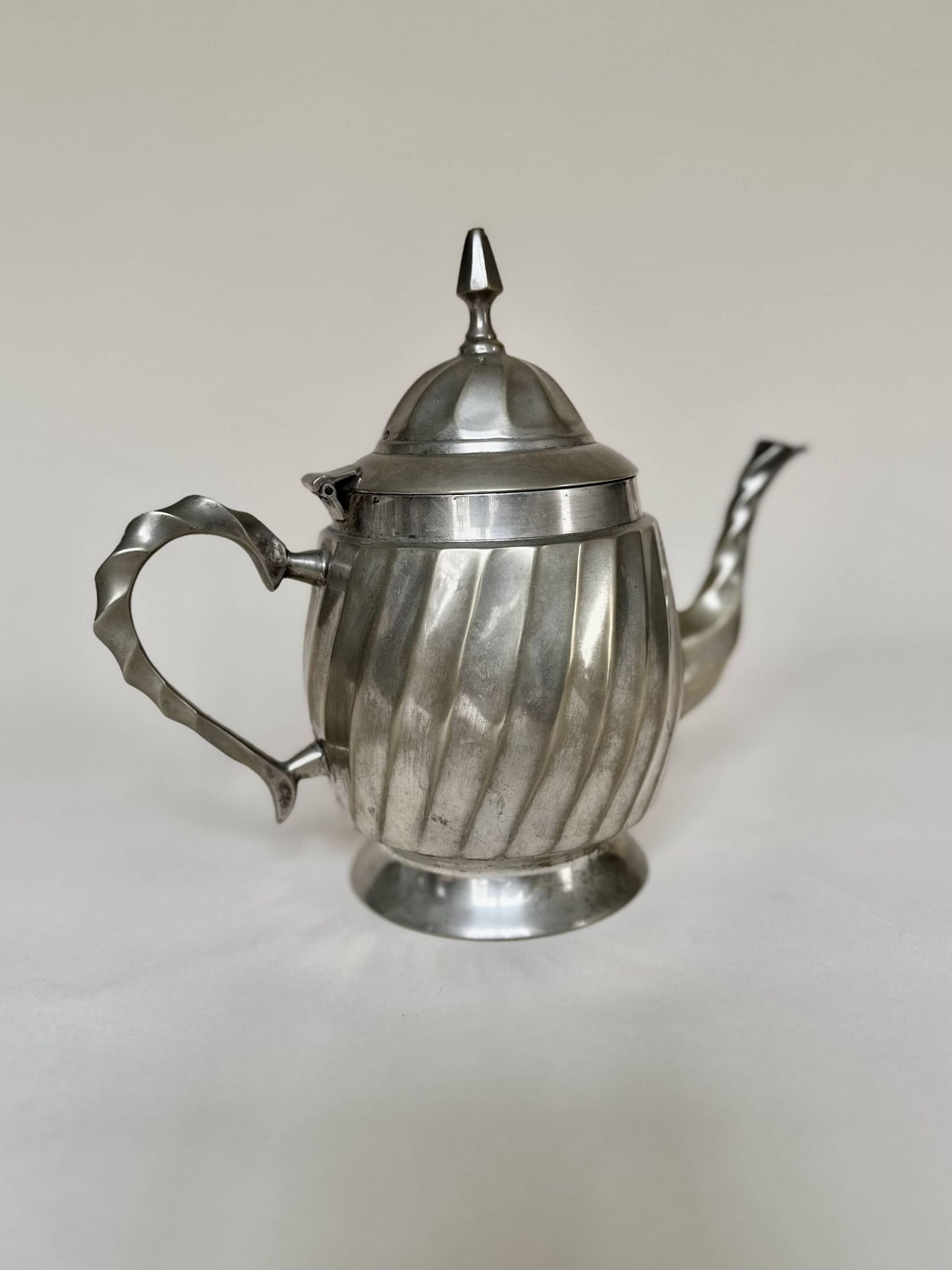 Silver-plated metal teapot with fluted body in Art Deco style