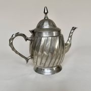 Silver-plated metal teapot with fluted body in Art Deco style
