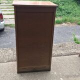 Brown lacquered wooden industrial cabinet with sliding curtain, 1950s, Czech Republic.
