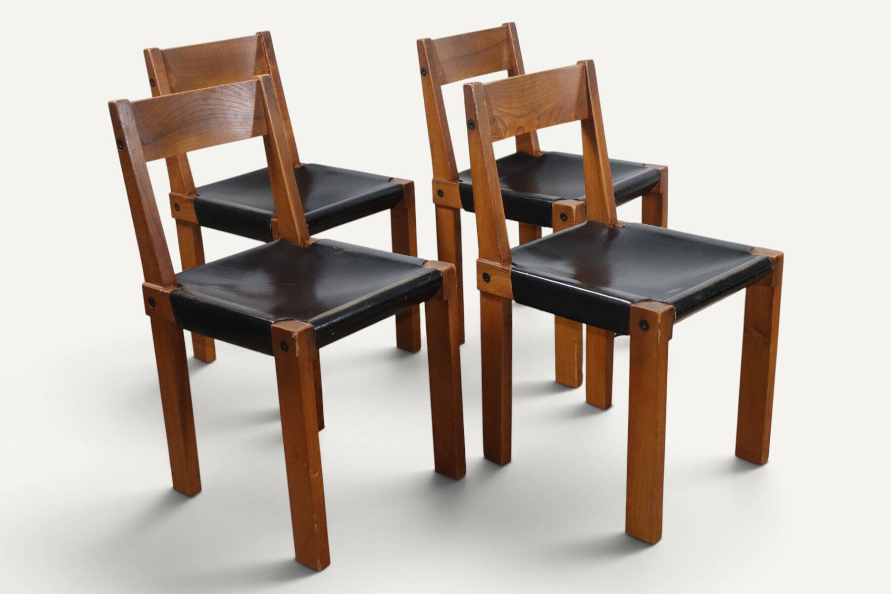 Set of 4 S24 chairs by Pierre Chapo – Solid elm and black leather – 1970