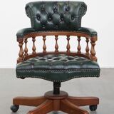 Dark green chesterfield office chair in cowhide leather on wheels