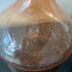 Blown glass decanter with bubble.