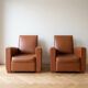 Pair of vintage brown leather club chairs
