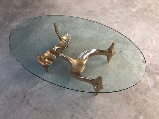 Bronze and glass coffee table with female sculpture by Victor Roman