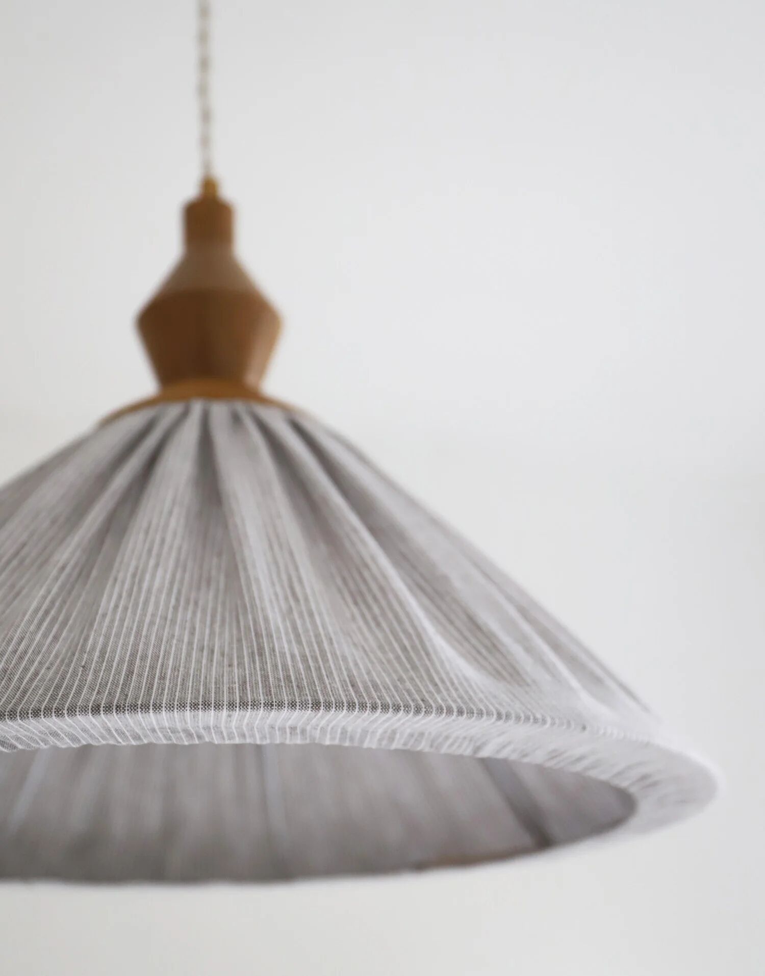 Pleated curtain Olga in linen and cotton with fine classic grey stripes.