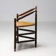 Mid Century Antiques spindle wood chaise with a rush seat.