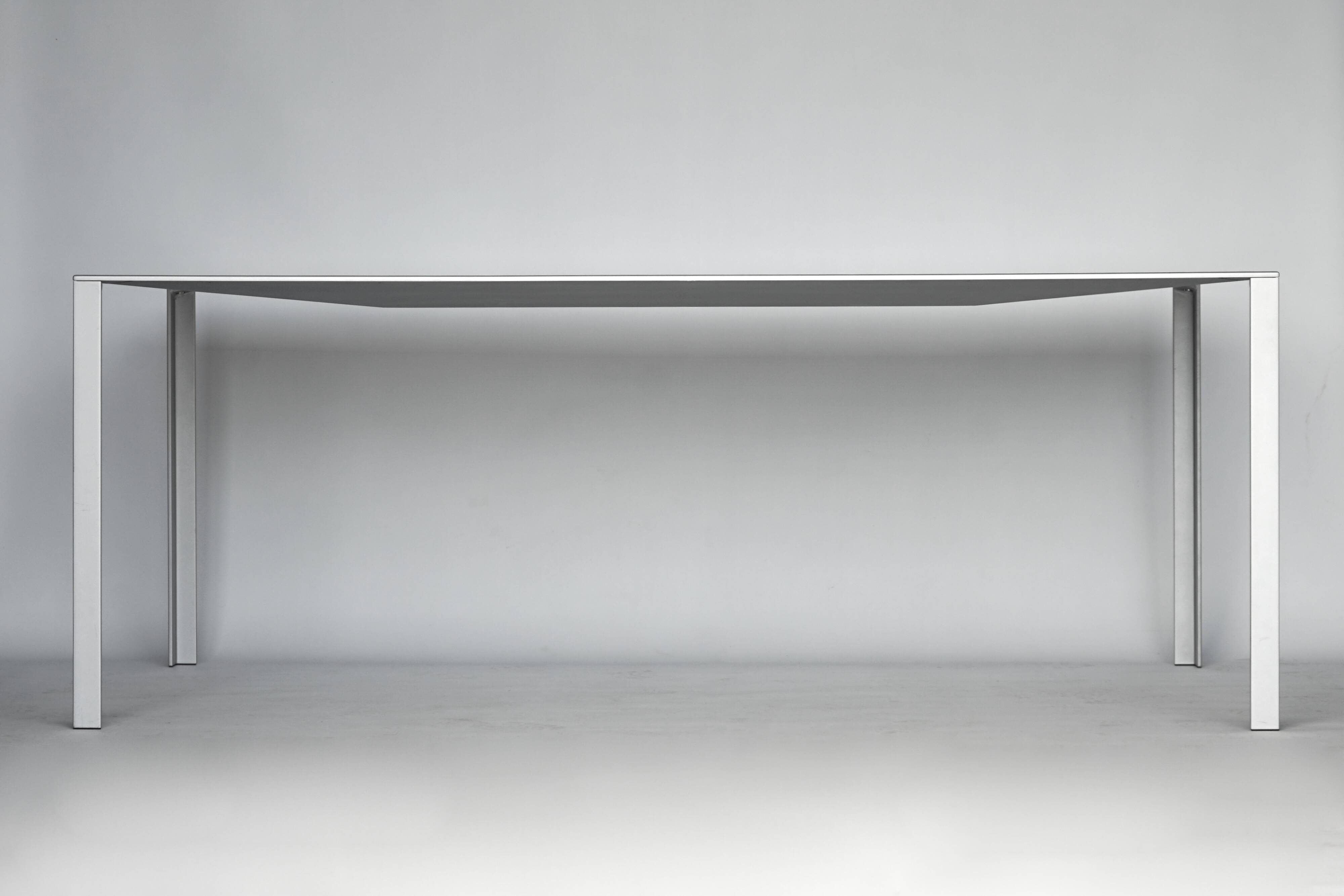 Minimalist table "Less" by Jean Nouvel for Molteni. 1990s.