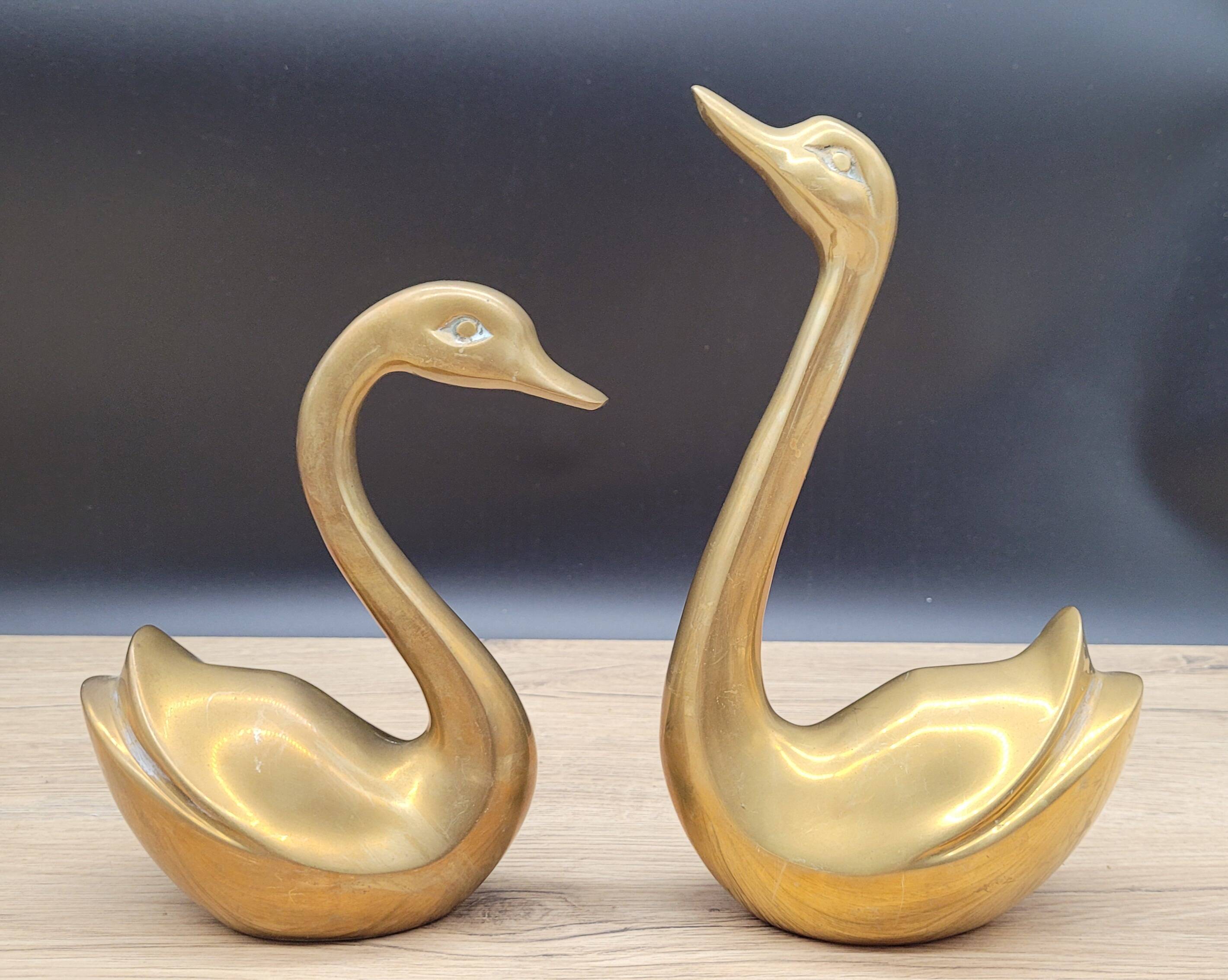 Pair brass swans