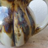 Ceramic pitcher in the shape of a coloquinte melo.
