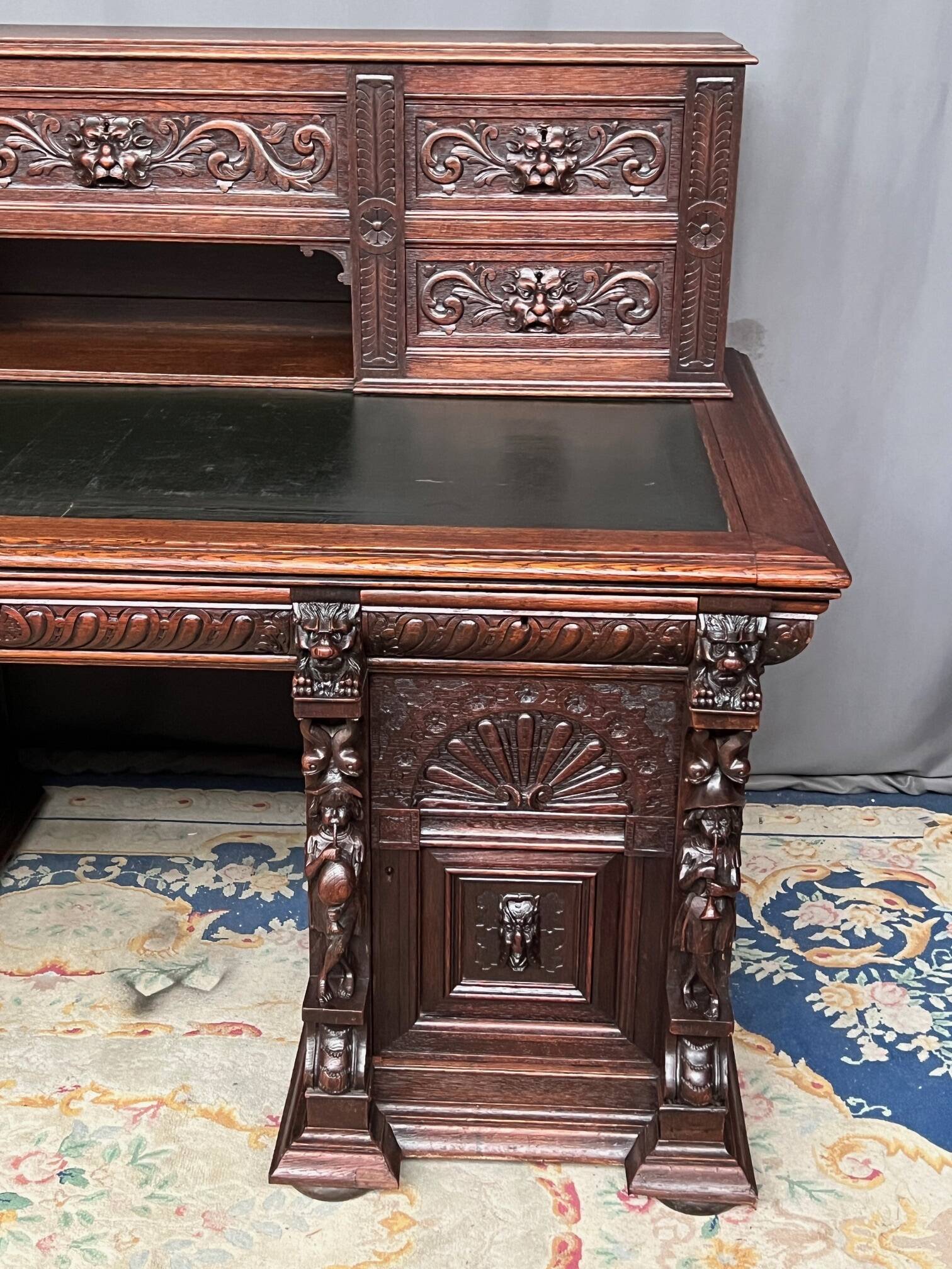 Old Renaissance style desk. Solid oak. France. Late 19th century.